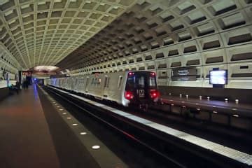 Metro train with 50 on board derails outside Reagan National airport, no reported injuries